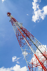 Image showing Telecommunications tower with blue sky and cloud