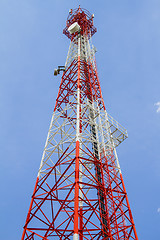 Image showing Telecommunications tower with blue sky and cloud