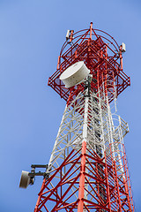 Image showing Telecommunications tower with blue sky and cloud