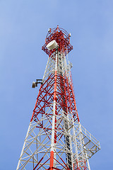 Image showing Telecommunications tower with blue sky and cloud