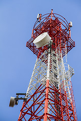 Image showing Telecommunications tower with blue sky and cloud