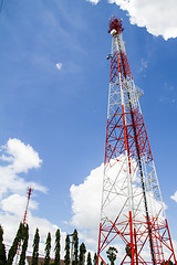 Image showing Telecommunications tower with blue sky and cloud