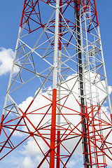 Image showing Telecommunications tower with blue sky and cloud