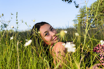 Image showing The girl in the grass