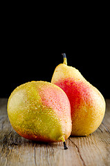 Image showing Pears in a old wooden table