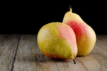 Image showing Pears in a old wooden table