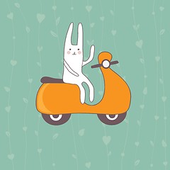 Image showing Cute white rabbit on the orange scooter