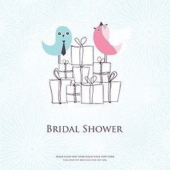 Image showing Bridal shower invitation with two cute birds in bride and groom costumes sitting on the present boxes