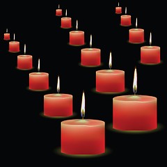 Image showing red candles on black background