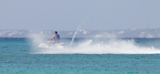 Image showing Cruising on the Caribbean Sea on a jet ski