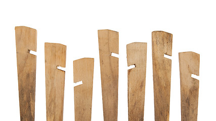 Image showing Seven wooden tent pegs