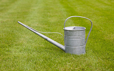 Image showing Very old metal watering-can