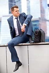 Image showing successful businessman resting