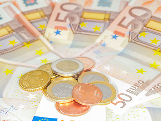 Image showing Coins over 50 Euro bills