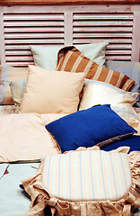 Image showing Bed with lots of pillows