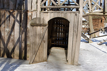 Image showing wooden playground house door cover ice snow winter 