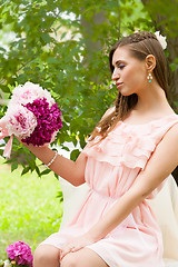 Image showing Attractive woman with flowers