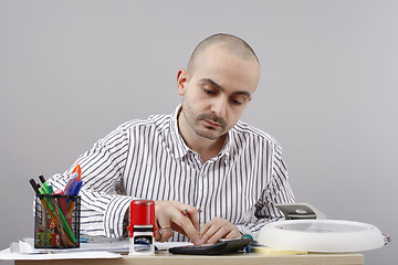 Image showing Man at desk