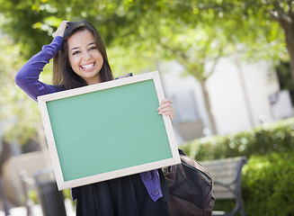 Image showing Excited Mixed Race Female Student Holding Blank Chalkboard