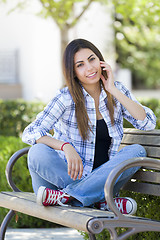 Image showing Mixed Race Female Student Portrait on School Campus Bench