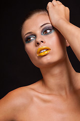 Image showing woman with extreme colorfull make up in blue and yellow