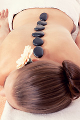 Image showing attractive helathy caucasian woman hot stone massage wellness 