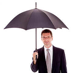 Image showing mature attractive business man with umbrella isolated