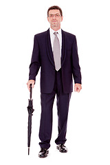 Image showing mature attractive business man with umbrella isolated