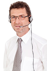 Image showing smiling mature male operator businessman with headset call senter