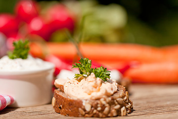 Image showing fresh tasty homemade cream cheese and herbs with bread