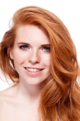 Image showing beautiful young redhead woman with freckles portrait