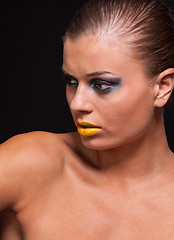 Image showing woman with extreme colorfull make up in blue and yellow