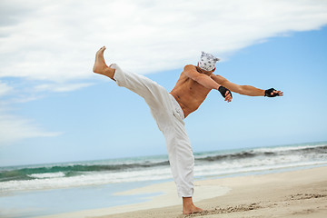 Image showing man is jumping sport karate martial arts fight kick