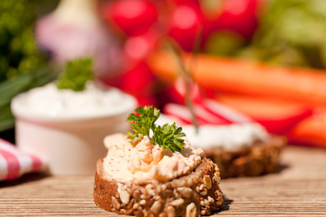 Image showing fresh tasty homemade cream cheese and herbs with bread