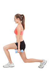 Image showing young attractive woman stretching legs after jogging isolated