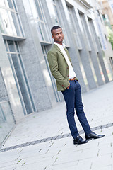 Image showing young successful african business man outdoor in summer