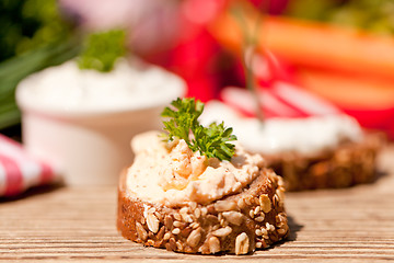 Image showing fresh tasty homemade cream cheese and herbs with bread