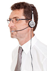 Image showing smiling mature male operator businessman with headset call senter