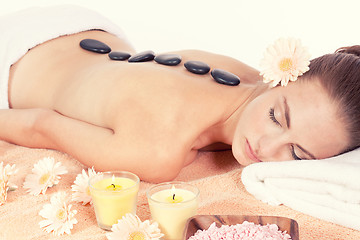 Image showing attractive helathy caucasian woman hot stone massage wellness 