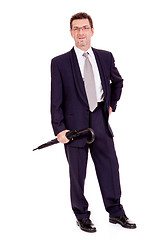 Image showing mature attractive business man with umbrella isolated