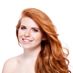 Image showing beautiful young redhead woman with freckles portrait