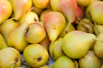 Image showing fresh tasty pear fruit on market outdoor in summer