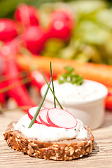 Image showing fresh tasty homemade cream cheese and herbs with bread