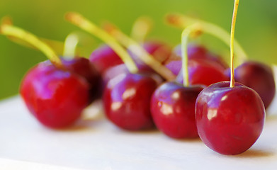 Image showing fresh cherries on table 