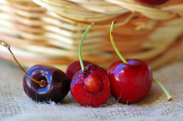Image showing ripe red cherrys on table