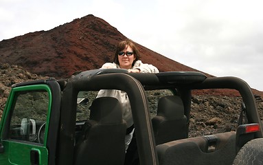 Image showing Woman in jeep