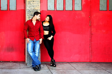 Image showing Young Couple Red Doors