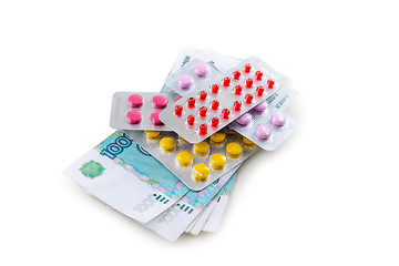 Image showing Pills and money