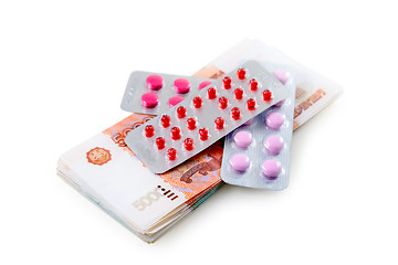 Image showing Pills and money