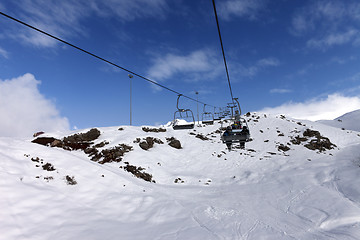 Image showing Chair-lift at winter mountains